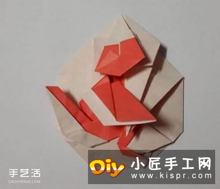 折纸带猴子图案胸章的教程